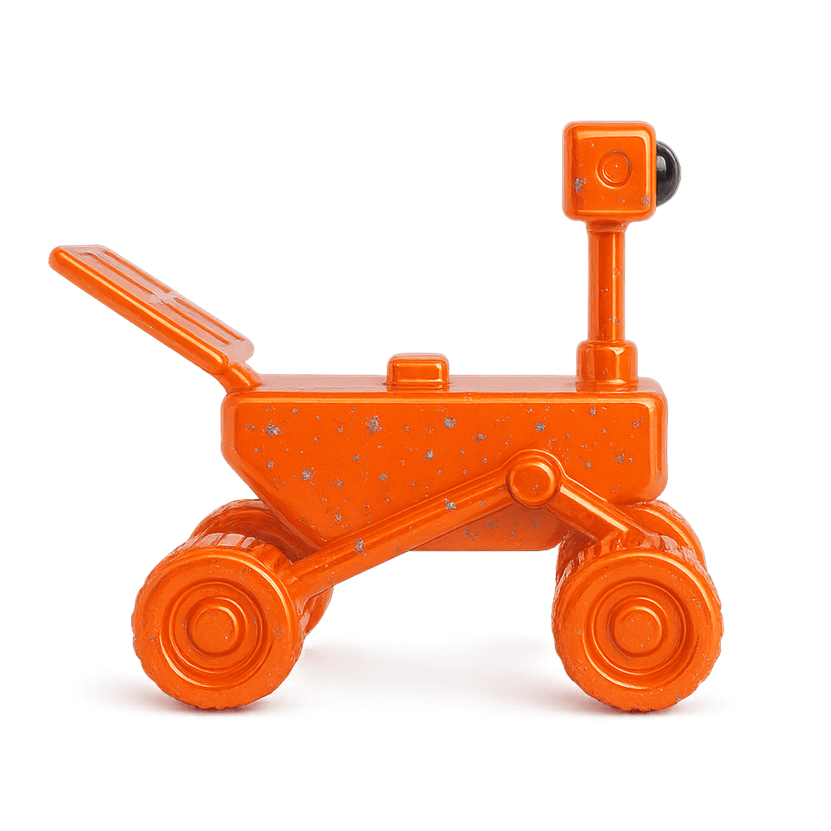 an orange colour rover covered with silver flakes moving from left to right